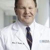Becker E Carl, MD